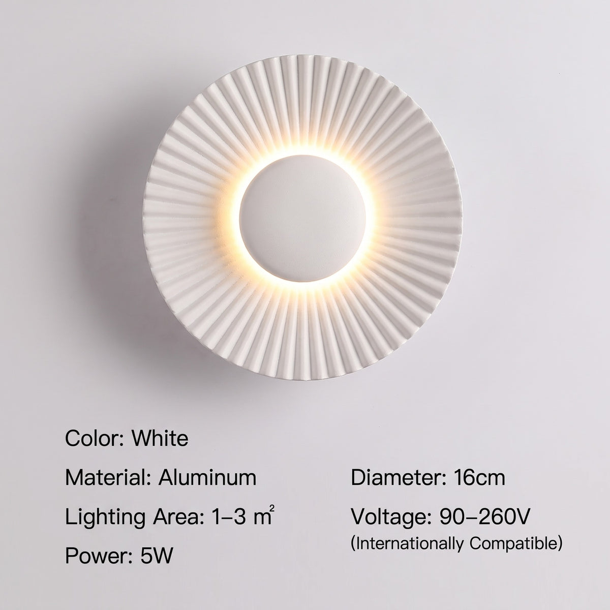 Applique murale LED dimmable avec fonction 3 tons de lumière, en finition blanc mat, apportant une touche de sophistication à une salle à manger.
