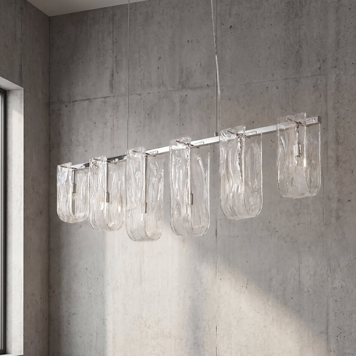 Détail de la source lumineuse LED G9 incluse dans chaque abat-jour en verre givré, garantissant une faible consommation d'énergie.